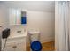 Cozy bathroom featuring a toilet, sink with vanity, mirror, and shower with curtain at 1630 Hinson Rd, Martinsville, IN 46151