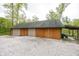 Spacious three car garage with white gravel driveway at 1630 Hinson Rd, Martinsville, IN 46151