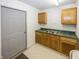 Functional garage featuring a sink and cabinets at 1630 Hinson Rd, Martinsville, IN 46151