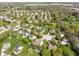 Neighborhood aerial view showcases well-maintained homes with lush landscaping and mature trees at 18811 Orleans Ct, Noblesville, IN 46060