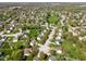 Aerial view of a neighborhood with mature trees, well maintained lawns, and quiet streets at 18811 Orleans Ct, Noblesville, IN 46060