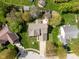 Well-maintained home features a large lawn, mature trees, concrete patio with a fire pit, and play area at 18811 Orleans Ct, Noblesville, IN 46060