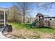 Backyard with lawn, playset, and partial fence at 18811 Orleans Ct, Noblesville, IN 46060