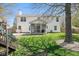Large backyard features a screened-in porch, patio area, play set and lush lawn perfect for outdoor enjoyment at 18811 Orleans Ct, Noblesville, IN 46060