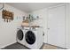 Laundry room featuring modern side-by-side washer and dryer units at 18811 Orleans Ct, Noblesville, IN 46060