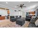 Open living space with office and kitchen views featuring modern furnishings and a seamless flow at 18811 Orleans Ct, Noblesville, IN 46060