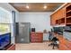 Office features a wood ceiling, custom cabinets and a large security safe at 18811 Orleans Ct, Noblesville, IN 46060