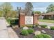 Welcoming neighborhood sign with brick accents and tasteful landscaping creates an inviting community atmosphere at 18811 Orleans Ct, Noblesville, IN 46060