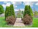 Beautiful backyard with a walkway, gazebo, lush green lawn and mature landscaping at 19248 Searay Dr, Noblesville, IN 46060