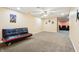 Finished basement featuring plush carpeting, recessed lighting, ceiling fan and modern futon at 19248 Searay Dr, Noblesville, IN 46060