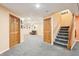 Basement entry with hardwood doors and staircase at 19248 Searay Dr, Noblesville, IN 46060