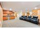 Finished basement features a custom bar area and theater seating for entertainment at 19248 Searay Dr, Noblesville, IN 46060