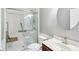 Modern bathroom featuring a glass-enclosed shower with a built-in seat and a sleek vanity at 19248 Searay Dr, Noblesville, IN 46060