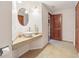 Bathroom featuring a modern sink and vanity with elegant fixtures and warm lighting at 19248 Searay Dr, Noblesville, IN 46060