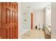 Well-lit bathroom with a walk-in shower, vanity, and tiled floors at 19248 Searay Dr, Noblesville, IN 46060