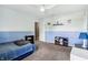 Spacious bedroom with two-tone walls, a ceiling fan, and neutral carpet flooring at 19248 Searay Dr, Noblesville, IN 46060