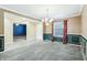 Bright dining room with carpeting, decorative molding, and a view of the entrance at 19248 Searay Dr, Noblesville, IN 46060