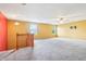 Spacious loft with high ceilings, ceiling fan and natural light with views to the exterior at 19248 Searay Dr, Noblesville, IN 46060