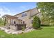 Backyard with a pergola-covered hot tub, lush green lawn, and mature trees, perfect for relaxation and entertaining at 19552 Wagon Trail Dr, Noblesville, IN 46060