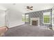 The living room features a fireplace and a black and white wallpapered accent wall at 19552 Wagon Trail Dr, Noblesville, IN 46060