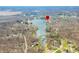Expansive aerial view of a lakeside community with mature trees and stunning water views at 2001 E Ely Ct, Martinsville, IN 46151