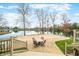 Lake view from the deck with a patio area and seating, perfect for relaxation and outdoor dining at 2001 E Ely Ct, Martinsville, IN 46151