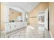 Bathroom vanity area showcasing dual sinks, custom cabinetry, and natural light at 2001 E Ely Ct, Martinsville, IN 46151