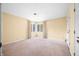 Spacious bedroom with neutral carpeting, bay window, and a double door closet at 2001 E Ely Ct, Martinsville, IN 46151