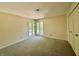 Spacious bedroom featuring a corner window and neutral-toned walls and carpet at 2001 E Ely Ct, Martinsville, IN 46151
