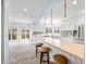 Spacious kitchen with granite countertops, stainless appliances, and ample seating at the breakfast bar at 2001 E Ely Ct, Martinsville, IN 46151