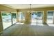 Bright living room with lake views and access to an outdoor deck through sliding glass doors at 2001 E Ely Ct, Martinsville, IN 46151