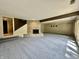Inviting living room features a stone fireplace and staircase at 2001 E Ely Ct, Martinsville, IN 46151