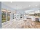 Open concept living space with hardwood floors, lake views, and a modern kitchen at 2001 E Ely Ct, Martinsville, IN 46151