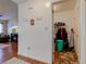 Bright hallway leading to a laundry area, offers convenient access to utility services and storage solutions at 2125 Jason Dr, Lebanon, IN 46052