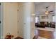 Hallway leading to a living room showcasing beautiful wood floors and a spacious living area at 2125 Jason Dr, Lebanon, IN 46052