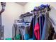 Laundry room with a front load washer and dryer, shelving unit and closet with clothes at 2125 Jason Dr, Lebanon, IN 46052