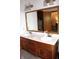 Dual sink bathroom with wood cabinets and plenty of counter space at 215 Fairway Ct, Franklin, IN 46131