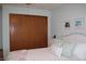 Bedroom with closet space, artwork, and comfortable bedding at 215 Fairway Ct, Franklin, IN 46131