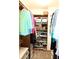 Walk-in closet with shelving and hanging storage for optimal organization at 215 Fairway Ct, Franklin, IN 46131
