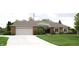 Charming single-story brick home with a well-manicured lawn and attached two car garage at 215 Fairway Ct, Franklin, IN 46131