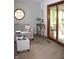 Inviting living room with sliding door access to the outdoor sunroom at 215 Fairway Ct, Franklin, IN 46131