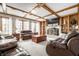 Beautiful living room featuring coffered ceiling, hardwood floors, and a fireplace at 225 Yorkshire E Blvd, Indianapolis, IN 46229