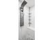 Modern shower with a large shower head, sleek design and built-in seat at 225 Yorkshire E Blvd, Indianapolis, IN 46229
