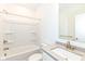 Well-lit bathroom with a shower-tub combination and a modern vanity with a framed mirror at 2418 Winthrop Ave, Indianapolis, IN 46205