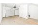 Spacious garage with a large garage door and ample storage space at 2418 Winthrop Ave, Indianapolis, IN 46205