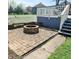 Outdoor patio with brick fire pit, ideal for entertaining and enjoying cozy evenings outdoors at 25 N Wayburn St, Indianapolis, IN 46229