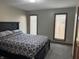 Comfortable bedroom with soft carpeting, natural light, and a neutral color scheme at 2550 16Th St, Columbus, IN 47201