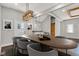 Bright dining room with a stylish oval table and modern pendant lighting fixture at 257 N Tacoma Ave, Indianapolis, IN 46201