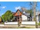 View of a two story home with an attractive wooden porch at 257 N Tacoma Ave, Indianapolis, IN 46201