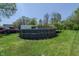 Spacious backyard featuring an above-ground pool with deck, offering a private outdoor oasis at 2658 S Rybolt Ave, Indianapolis, IN 46241
